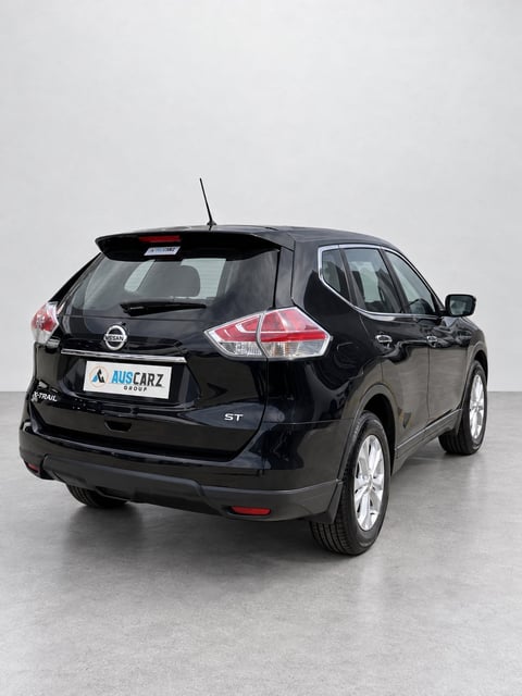 Black Nissan X-Trail T32 SUV with ST badge displayed in the AUSCARZ Group showroom