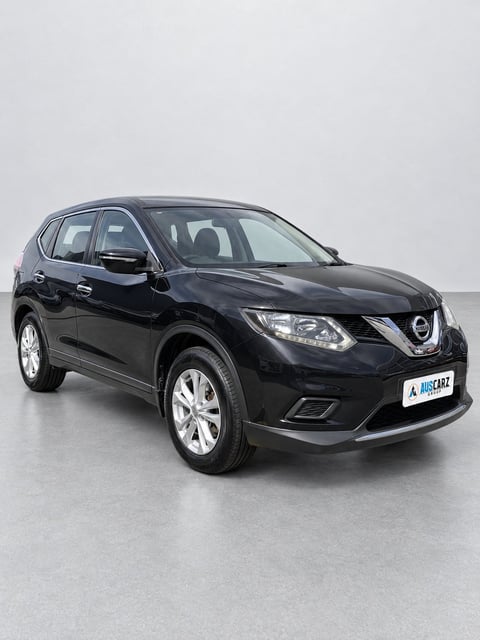 Black Nissan X-Trail T32 SUV photographed from the opposite front angle on a light grey background