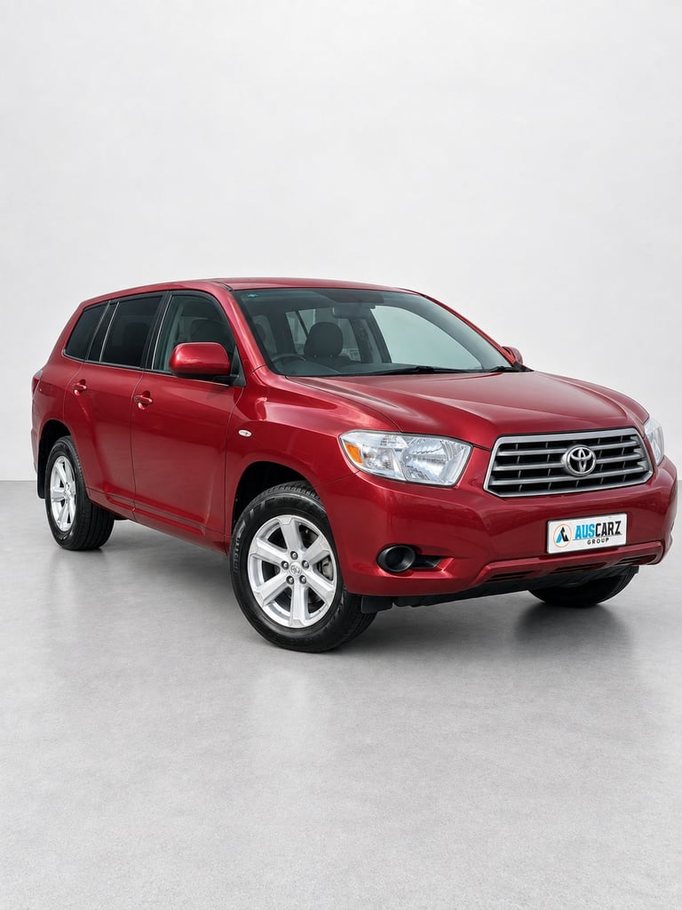 Red Toyota Kluger SUV photographed from the front three-quarter angle against a white background